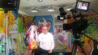 Karen and Tony interviewed with cameras